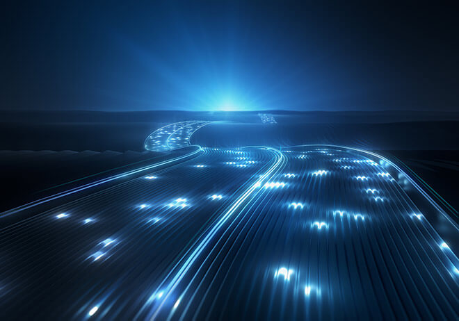 A futuristic looking roadway illustrates the concept of smart roads technologies. 